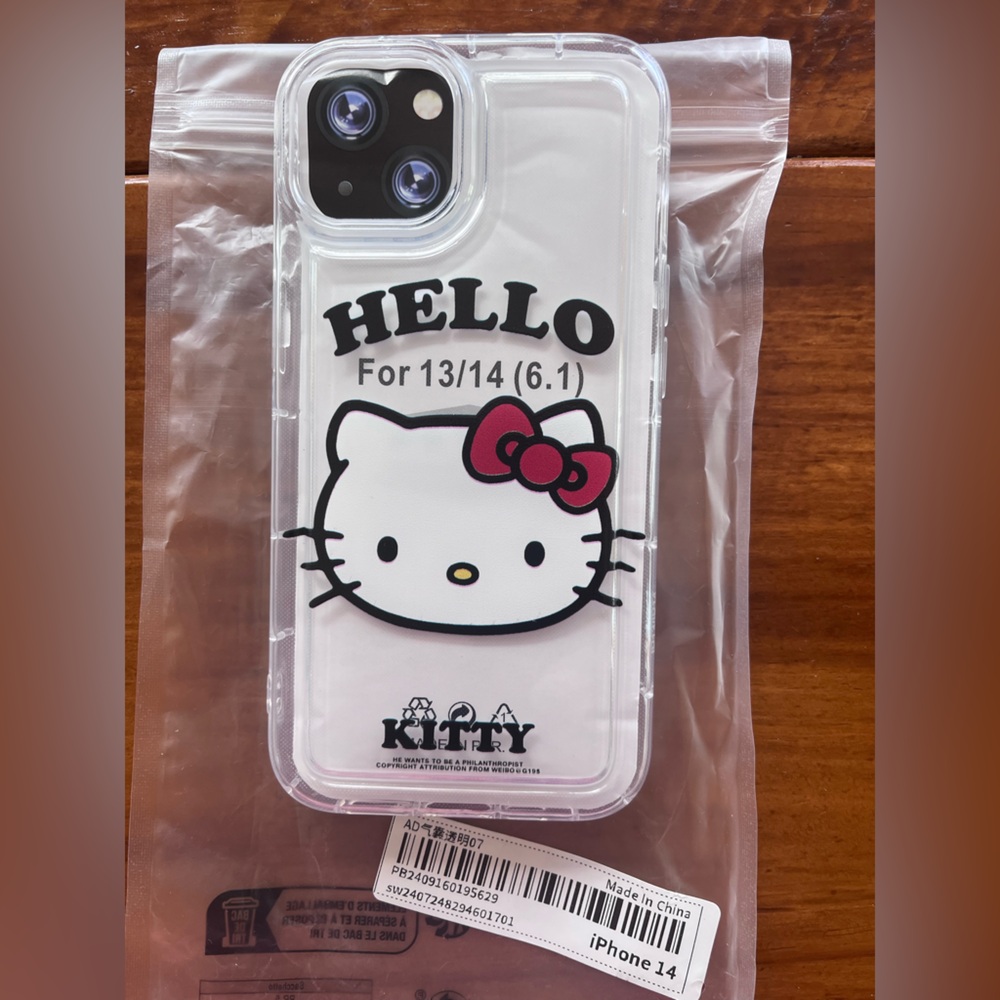 Hello Kitty iPhone 14 Case - Clear with Red Bow